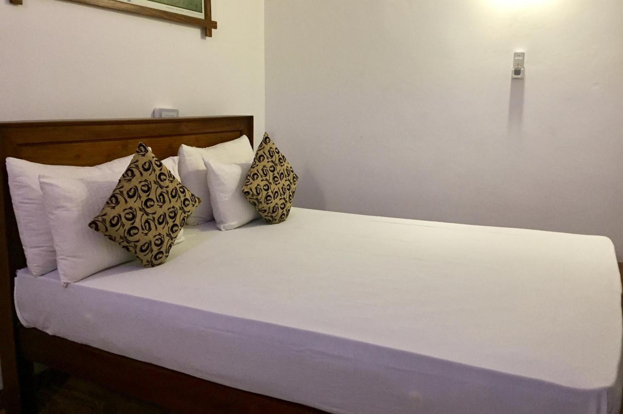 Thisara Guest House Polonnaruwa Rum bild